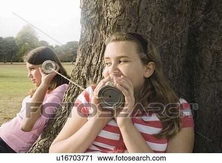 Stock Image - Kids with Tin Can Phones. Fotosearch