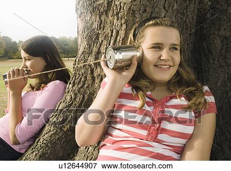 Kids with Tin Can Phones View Large Photo Image Stock Photo - Kids with Tin Can Phones. Fotosearch