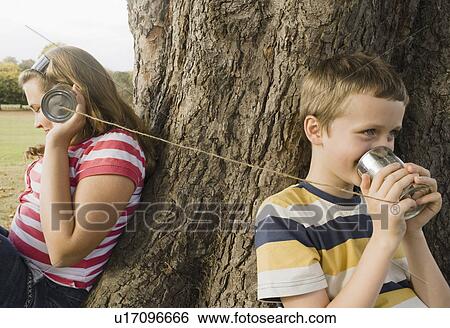 Stock Photograph - Kids with Tin Can Phones. Fotosearch