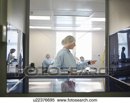 Stock Photography - Laboratory Clean Room Technician. Fotosearch