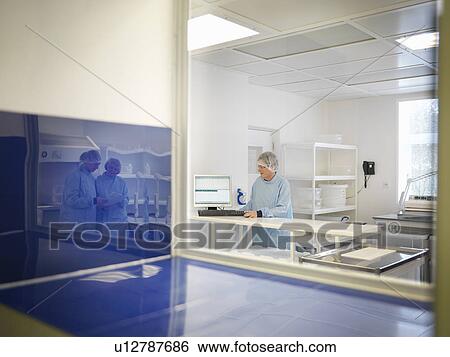 Laboratory Clean Room Technicians View Large Photo Image Stock Photograph - Laboratory Clean Room Technicians. Fotosearch