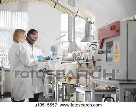 Stock Photo - Laboratory Technicians. Fotosearch
