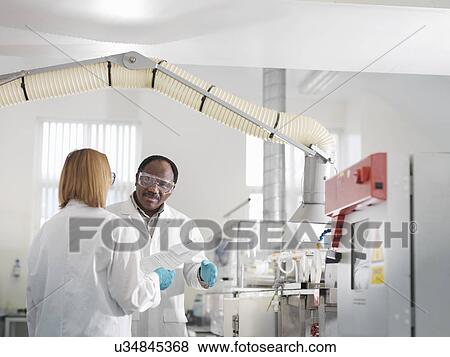 Stock Photo - Laboratory Technicians. Fotosearch