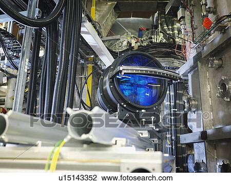 Stock Image - Large Lens In Fusion Reactor. Fotosearch