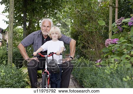 learning to ride a bicycle View Large Photo Image Stock Image - learning to ride a bicycle. Fotosearch