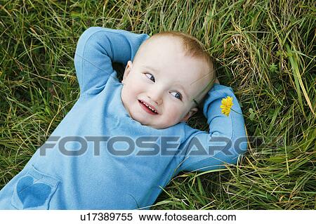 little child on meadow View Large Photo Image Stock Photography - little child on meadow. Fotosearch