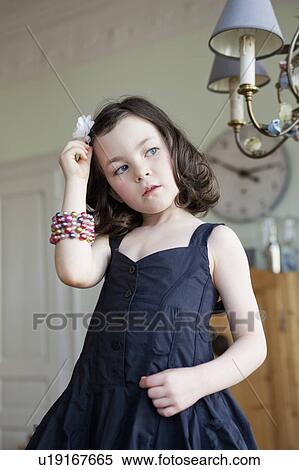little girl combing her hair View Large Photo Image Stock Photography - little girl combing her hair. Fotosearch