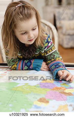 little girl exploring map with finger View Large Photo Image Stock Photography - little girl exploring map with finger. Fotosearch