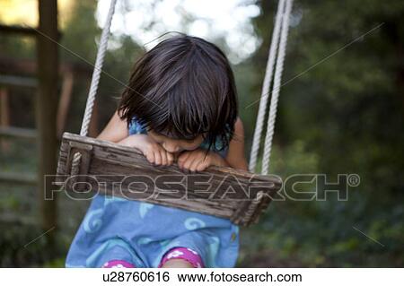 little girl on a swing View Large Photo Image Stock Photograph - little girl on a swing. Fotosearch
