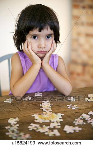 Stock Photo - little girl pouting. Fotosearch