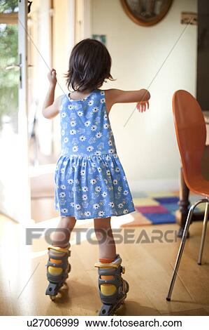 little girl roller skating indoors View Large Photo Image Stock Photo - little girl roller skating indoors. Fotosearch