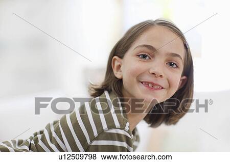 Stock Photo - little girl smiling all over the face. Fotosearch