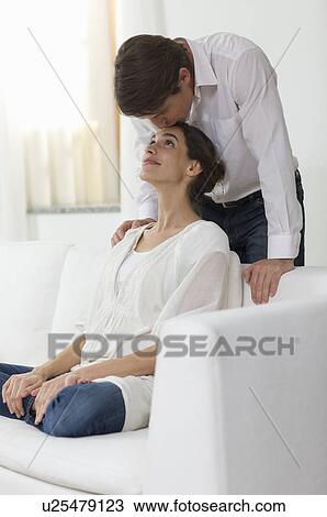 Stock Image - lovers at ease. Fotosearch