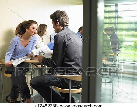 Lunch time at the office View Large Photo Image Stock Photo - Lunch time at the office. Fotosearch