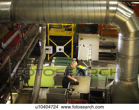 Picture - Male Factory Worker With Boxes. Fotosearch