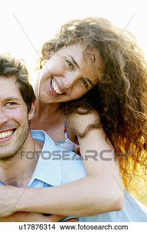 Man carrying woman View Large Photo Image Picture - Man carrying woman. Fotosearch
