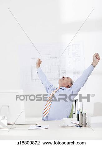 Man celebrating, stretching arms View Large Photo Image Stock Image - Man celebrating, stretching arms. Fotosearch