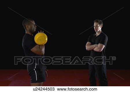 man demonstrating weight exercise View Large Photo Image Stock Image - man demonstrating weight exercise. Fotosearch