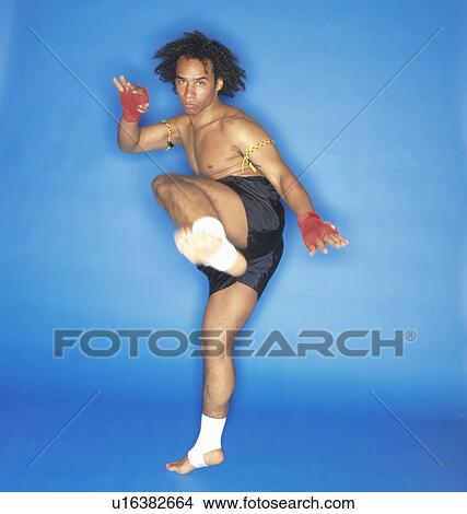 man doing martial art kick View Large Photo Image Picture - man doing martial art kick. Fotosearch