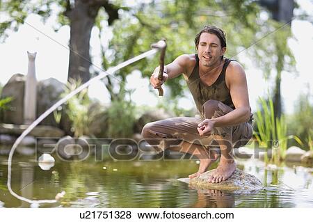 Man in a river View Large Photo Image Stock Photo - Man in a river. Fotosearch