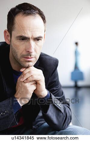 man in front with woman in background View Large Photo Image Stock Photography - man in front with woman in background. Fotosearch