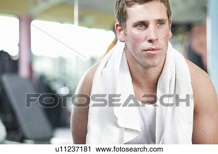 Stock Image - Man in gym. Fotosearch
