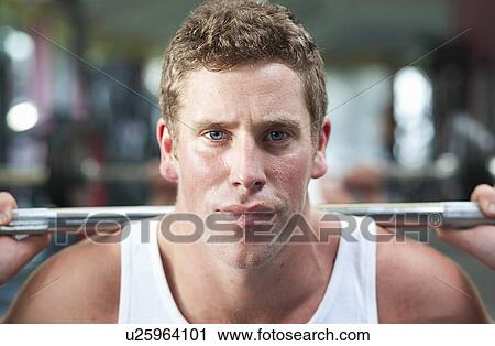 Man in gym View Large Photo Image Stock Image - Man in gym. Fotosearch