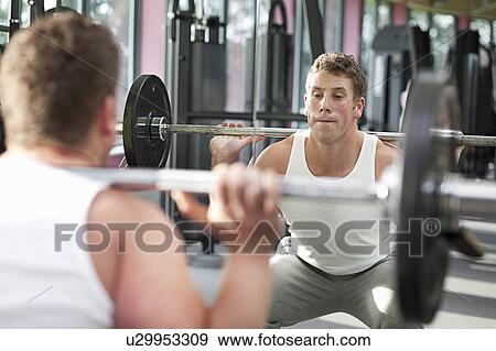 Stock Photo - Man in gym. Fotosearch