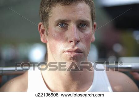 Stock Photograph - Man in gym. Fotosearch