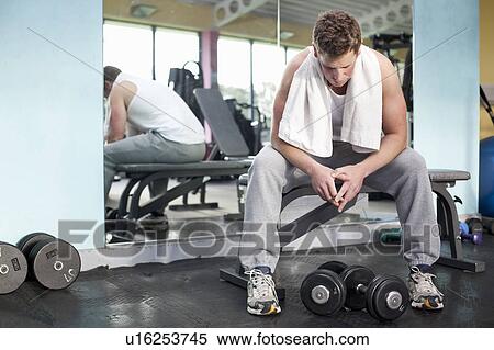 Stock Photography - Man in gym. Fotosearch