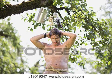 Stock Photo - man in nature. Fotosearch
