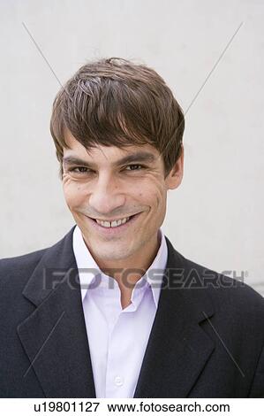 man in suit smiling at camera View Large Photo Image Stock Photo - man in suit smiling at camera. Fotosearch