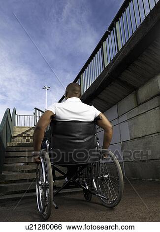 man in wheelchair in front of steps View Large Photo Image Stock Photograph - man in wheelchair in front of steps. Fotosearch