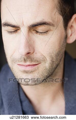 man listening with eyes closed View Large Photo Image Stock Image - man listening with eyes closed. Fotosearch