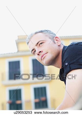 man looking around View Large Photo Image Stock Image - man looking around. Fotosearch