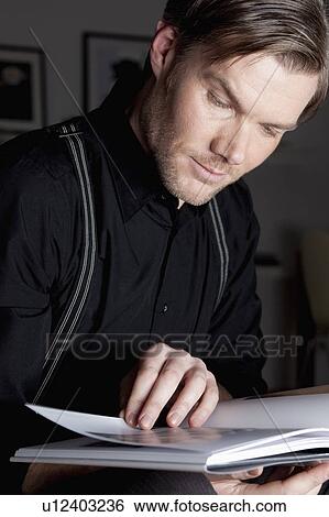 man reading book View Large Photo Image Stock Photograph - man reading book. Fotosearch