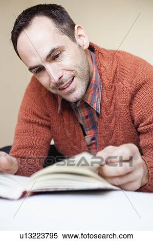man reading book View Large Photo Image Stock Photography - man reading book. Fotosearch