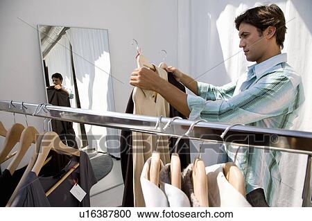 Stock Image - Man shopping. Fotosearch