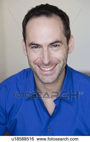 man smiling at viewer View Large Photo Image Stock Photograph - man smiling at viewer. Fotosearch