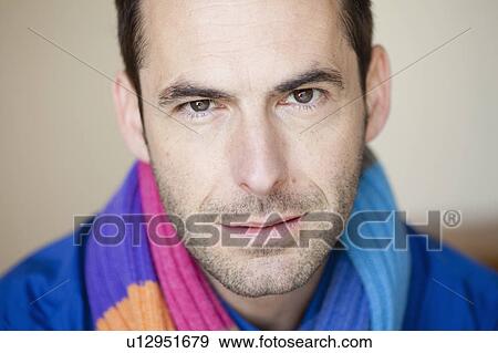 Stock Photo - man with scarf at viewer. Fotosearch