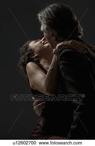 Stock Image - man & woman dancing. Fotosearch