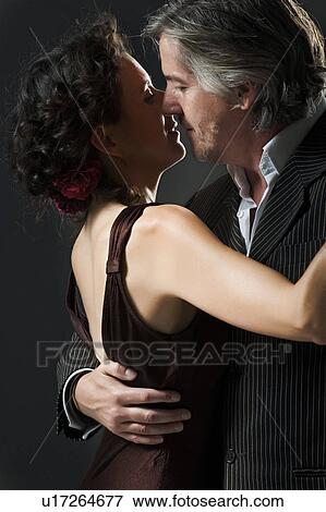 Stock Photo - man & woman dancing tango. Fotosearch