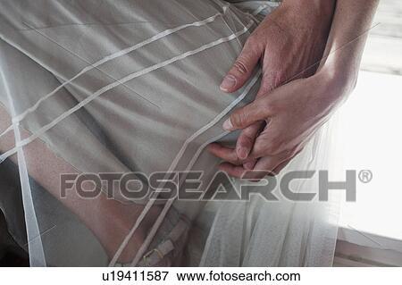 man & woman holding hands View Large Photo Image Stock Photo - man & woman holding hands. Fotosearch