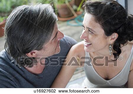 man & woman looking at each other View Large Photo Image Stock Image - man & woman looking at each other. Fotosearch