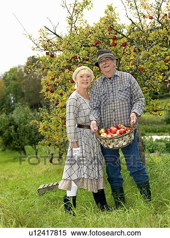 Mature couple in garden View Large Photo Image Stock Photography - Mature couple in garden. Fotosearch