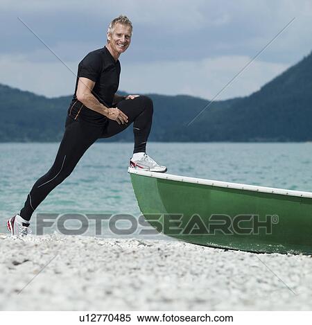 Stock Photography - Mature man stretching. Fotosearch