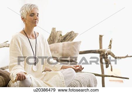 meditating woman View Large Photo Image Stock Photo - meditating woman. Fotosearch