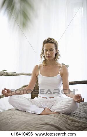 middle-aged woman doing yoga View Large Photo Image Stock Photograph - middle-aged woman doing yoga. Fotosearch