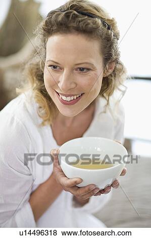 middle-aged woman drinking tea View Large Photo Image Stock Photo - middle-aged woman drinking tea. Fotosearch