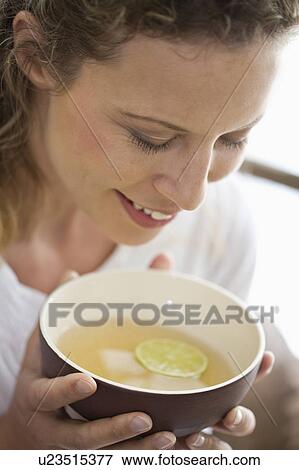 middle-aged woman drinking tea View Large Photo Image Stock Photo - middle-aged woman drinking tea. Fotosearch